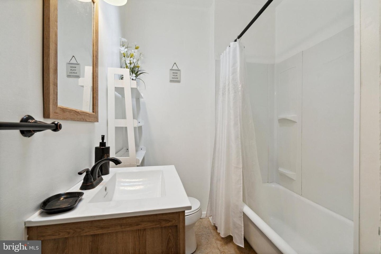 7117 Woolston Ave – photo 5