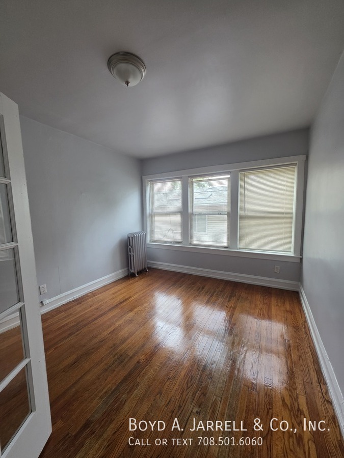 10853 S Vernon Ave – photo 1