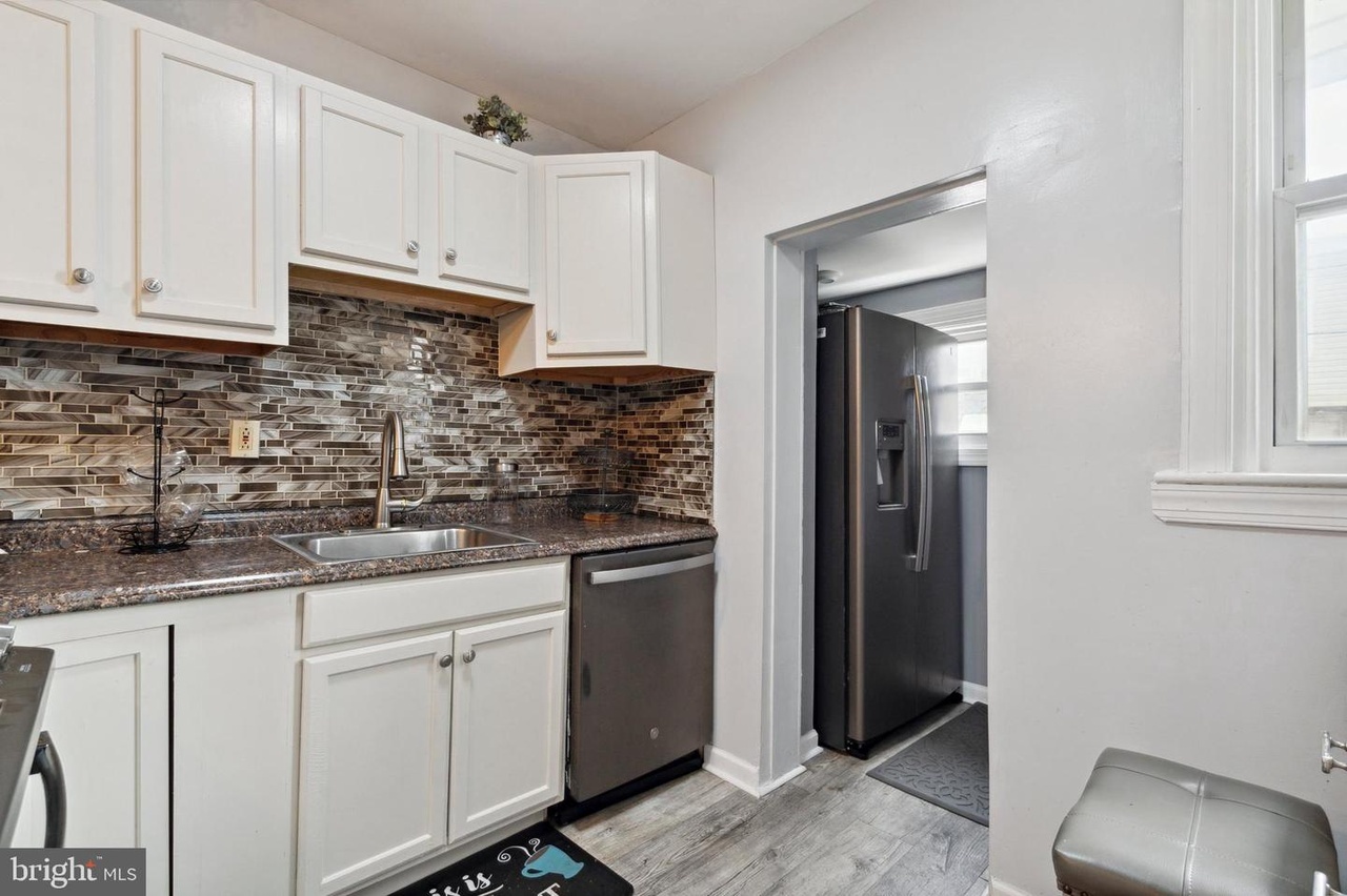7117 Woolston Ave – photo 4