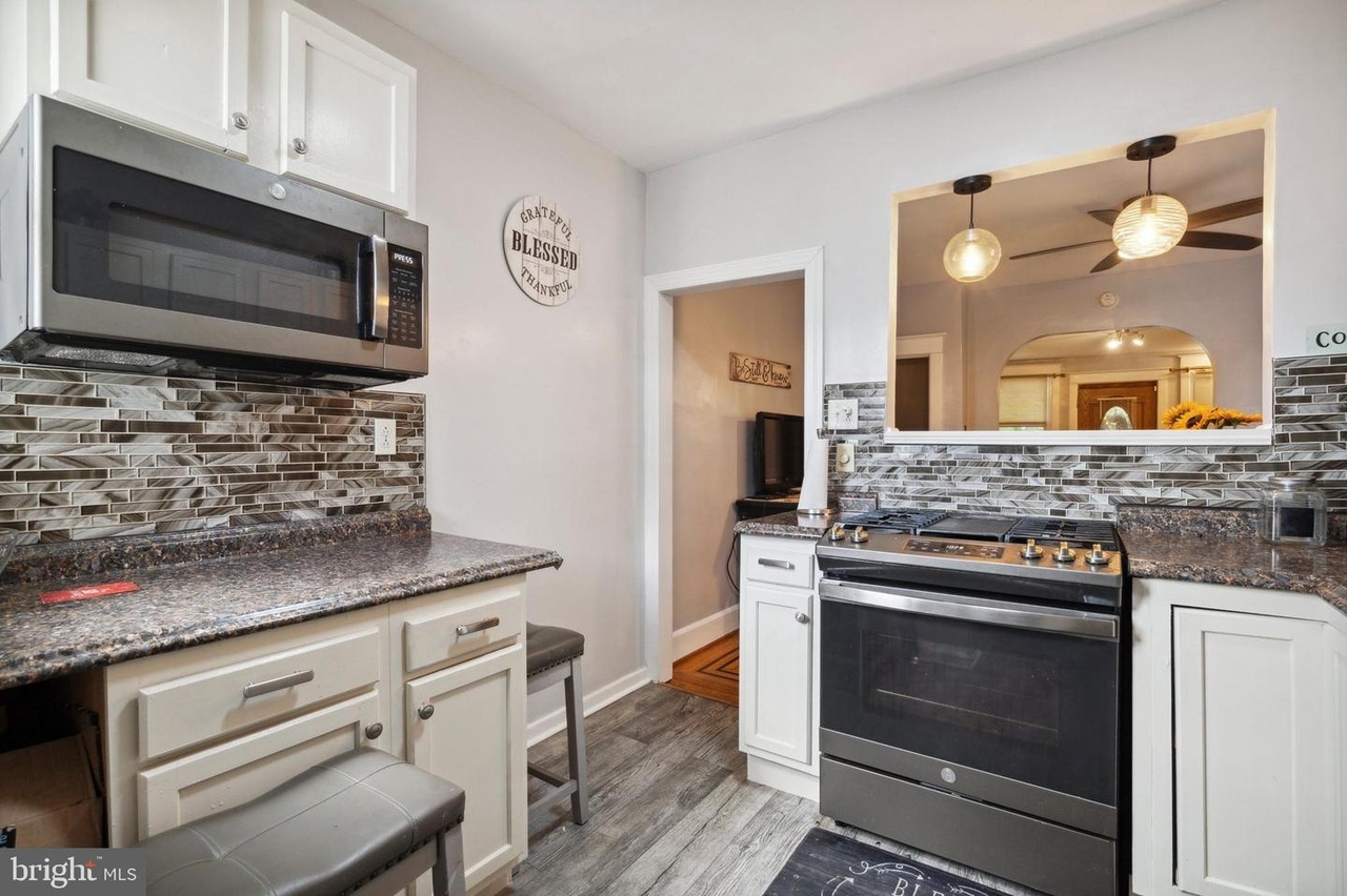 7117 Woolston Ave – photo 3
