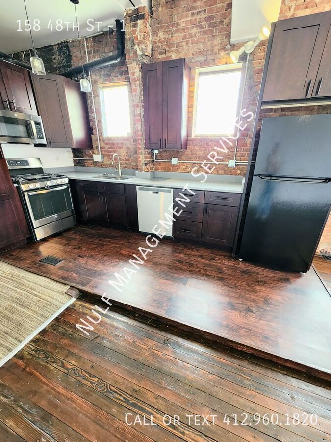158 48th St – photo 1