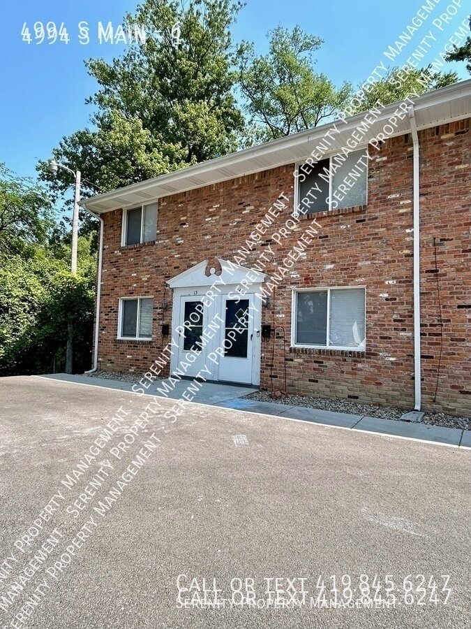 4994 Main St – photo 1