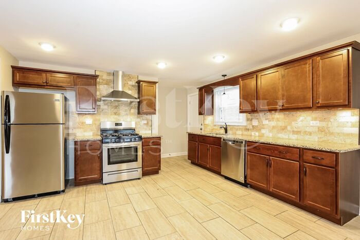 1018 E 161st Pl – photo 5