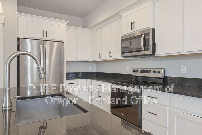 1730 NE Gilbert Ln – photo 3