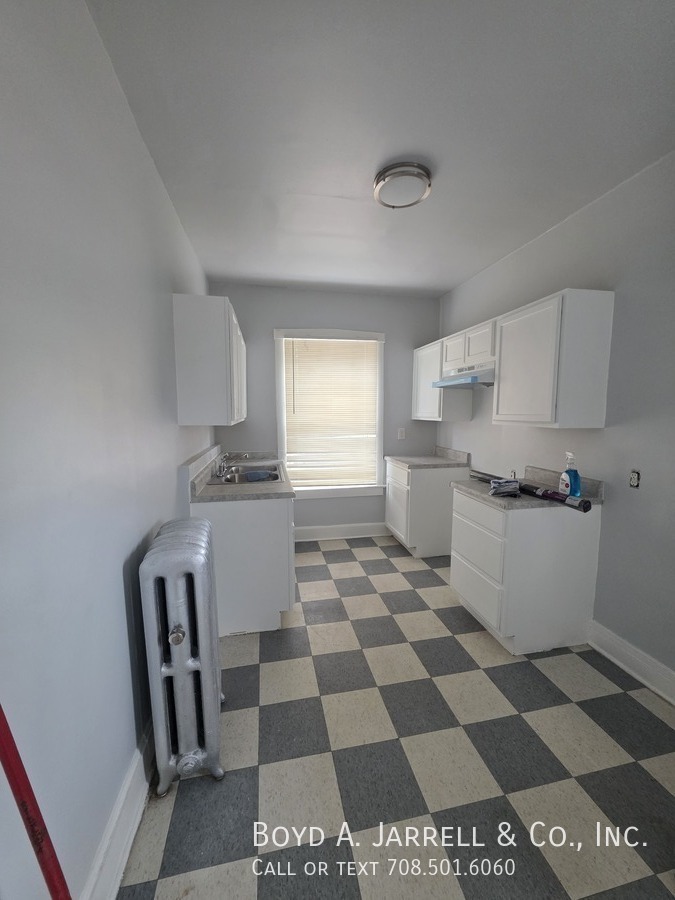 10853 S Vernon Ave – photo 5