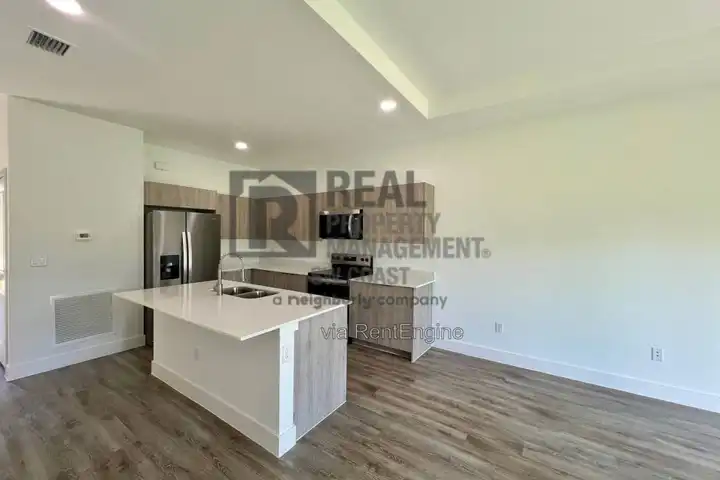 1265 Hillcrest St E - Lehigh Acres, FL | Rent.