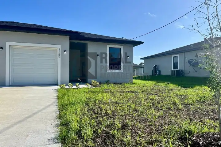 1265 Hillcrest St E - Lehigh Acres, FL | Rent.