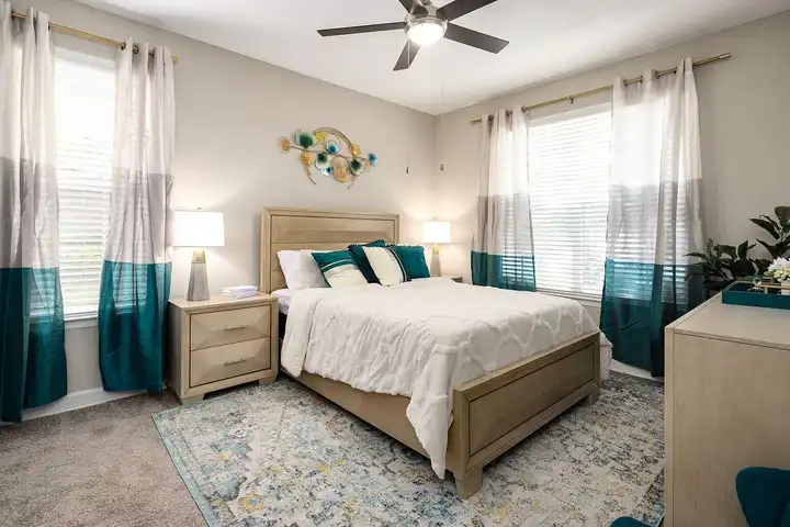 Contemporary teal-accented bedroom interior