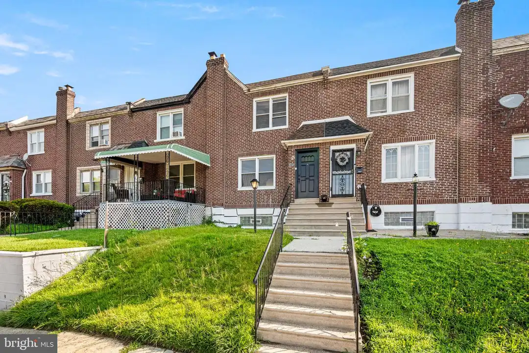 7611 Woolston Ave – photo 1