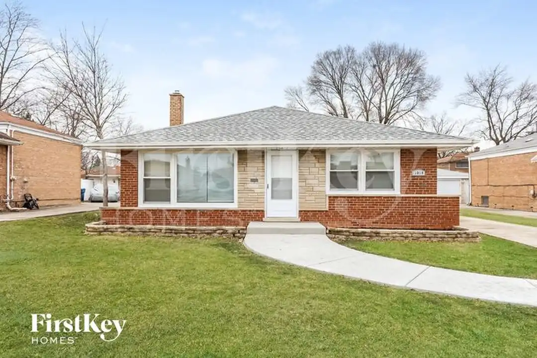 1018 E 161st Pl – photo 1 of 15
